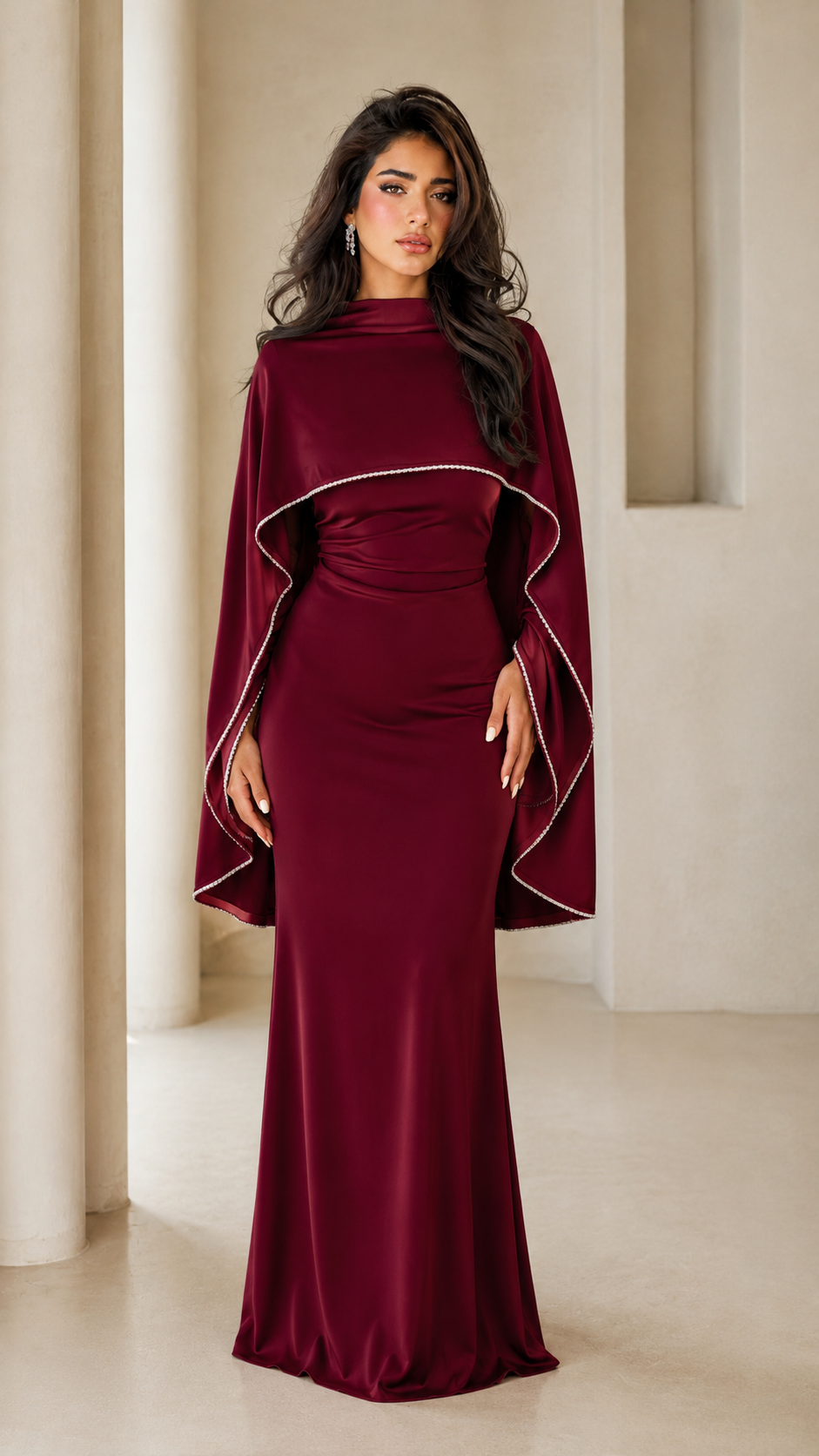 Burgundy floor-length mermaid evening dress with draped cape sleeves and embellished trim