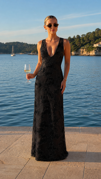 Front view of black deep V-neck embellished lace maxi evening dress