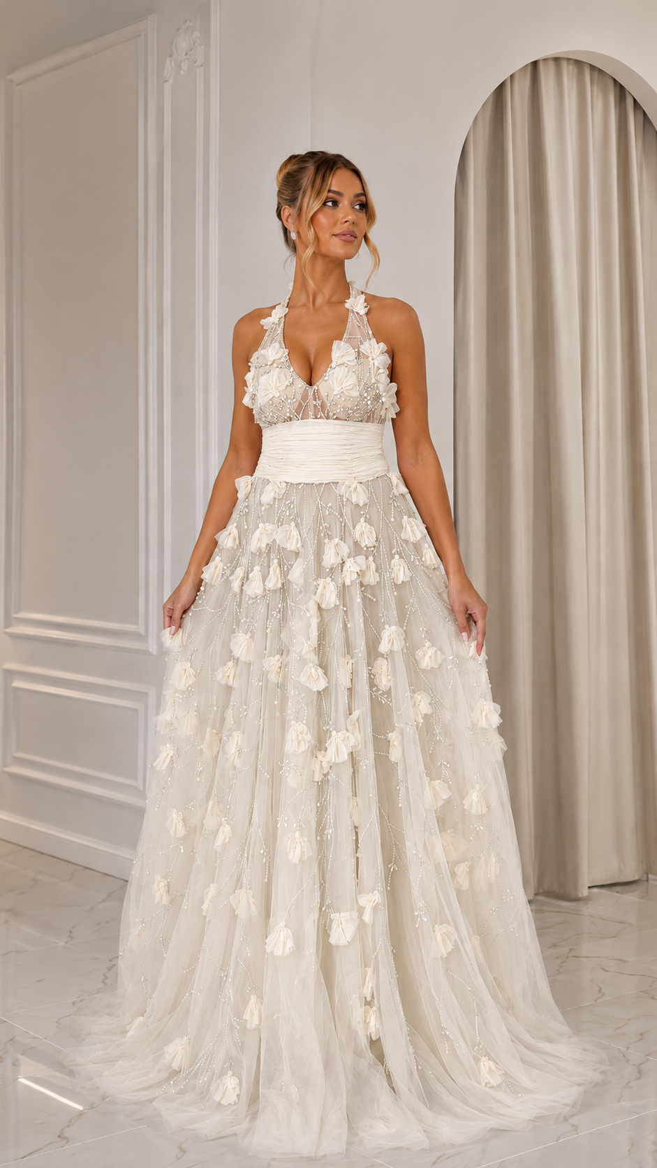 Front view of ivory halter evening gown with floral appliqué and beaded mesh overlay
