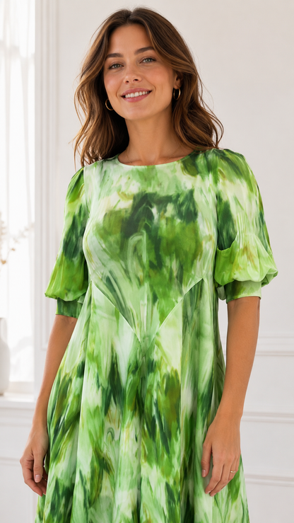 Close-up front view of lime green tie-dye midi dress with round neckline