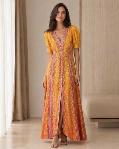 Front view of marigold printed puff sleeve V-neck maxi dress with front slit