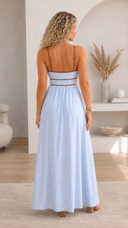 Back view of light blue pleated halter maxi dress with slim straps and pleated skirt