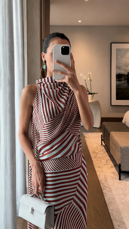 Close-up of red striped high-neck draped bodice on maxi dress