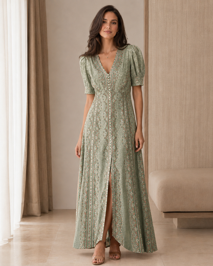 Front view of sage printed puff sleeve V-neck maxi dress with front slit
