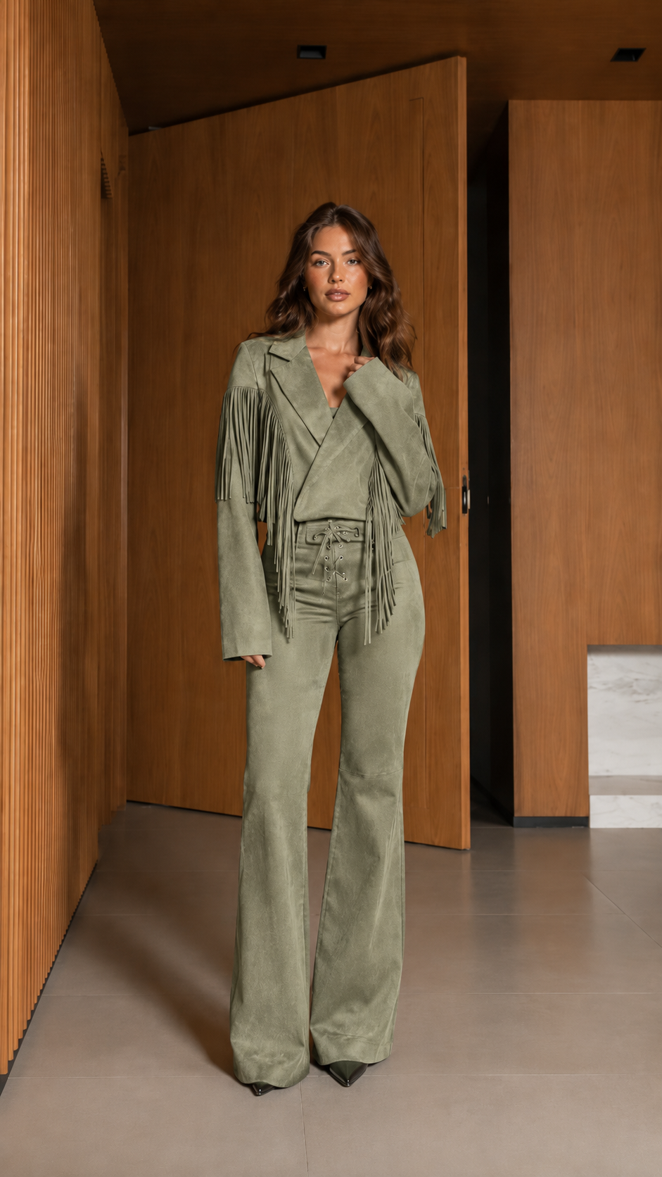 Full-length front view of sage green fringe wrap jacket and matching flare pants