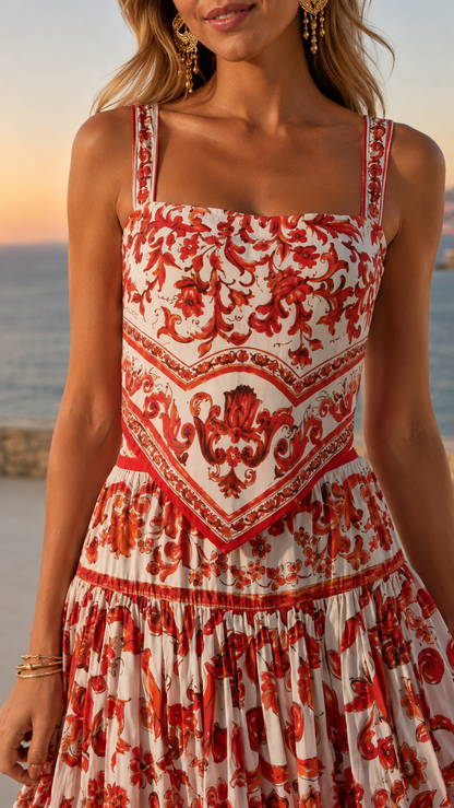 Close-up of red and white ornamental print bodice with square neckline