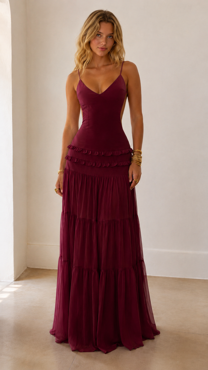 Burgundy fitted bodice maxi dress with spaghetti straps and layered skirt front view