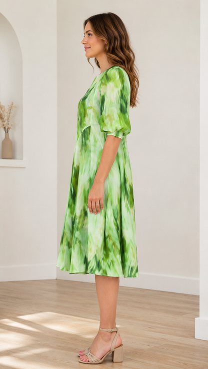 Side view of lime green tie-dye midi dress showing A-line silhouette