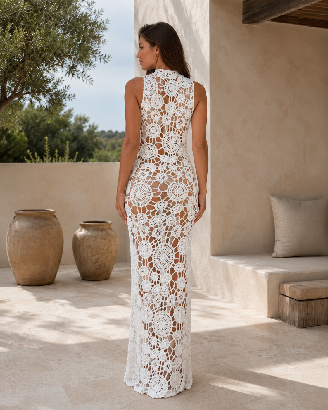 Back view of white sleeveless crochet lace maxi dress