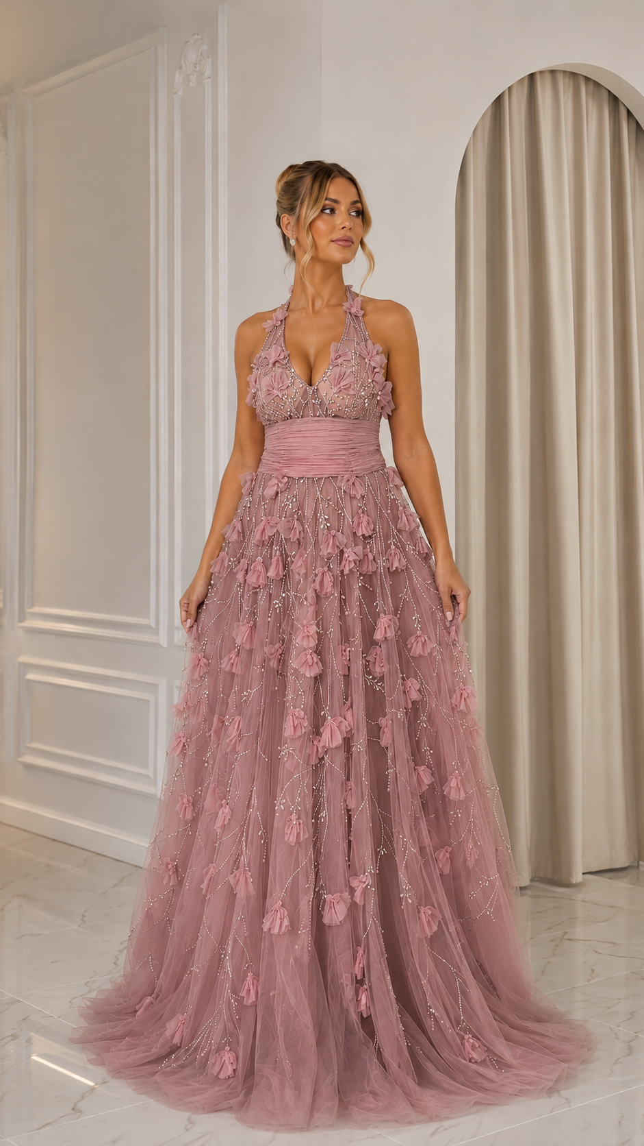 Front view of dusty rose halter evening gown with appliqué details and floor-length skirt