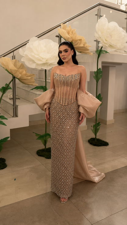 Champagne beaded evening gown with strapless corset bodice and floor-length silhouette