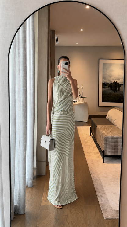 Full-length view of sage striped sleeveless draped maxi dress
