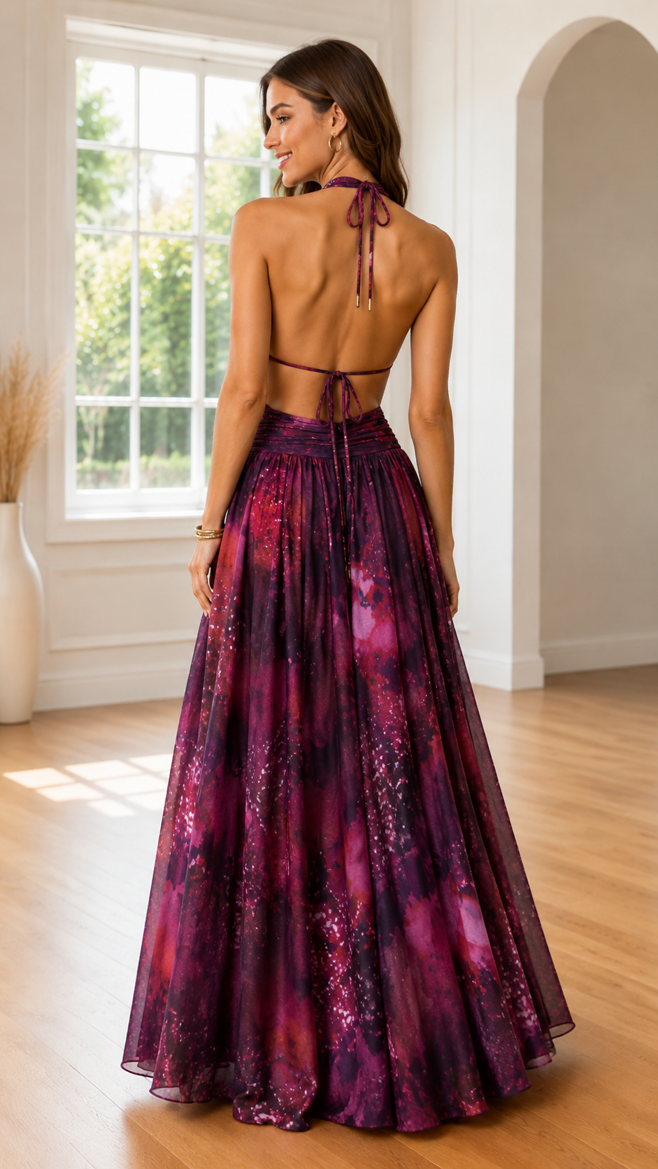 Back view of wine print halter maxi dress with open back and tie neck