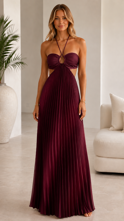 Front view of wine pleated halter maxi dress with ring detail