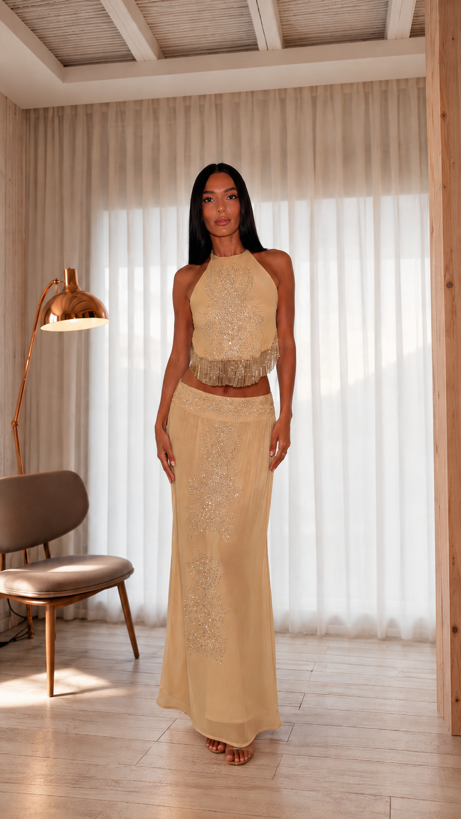 Front view of gold shimmer halter top and matching maxi skirt set