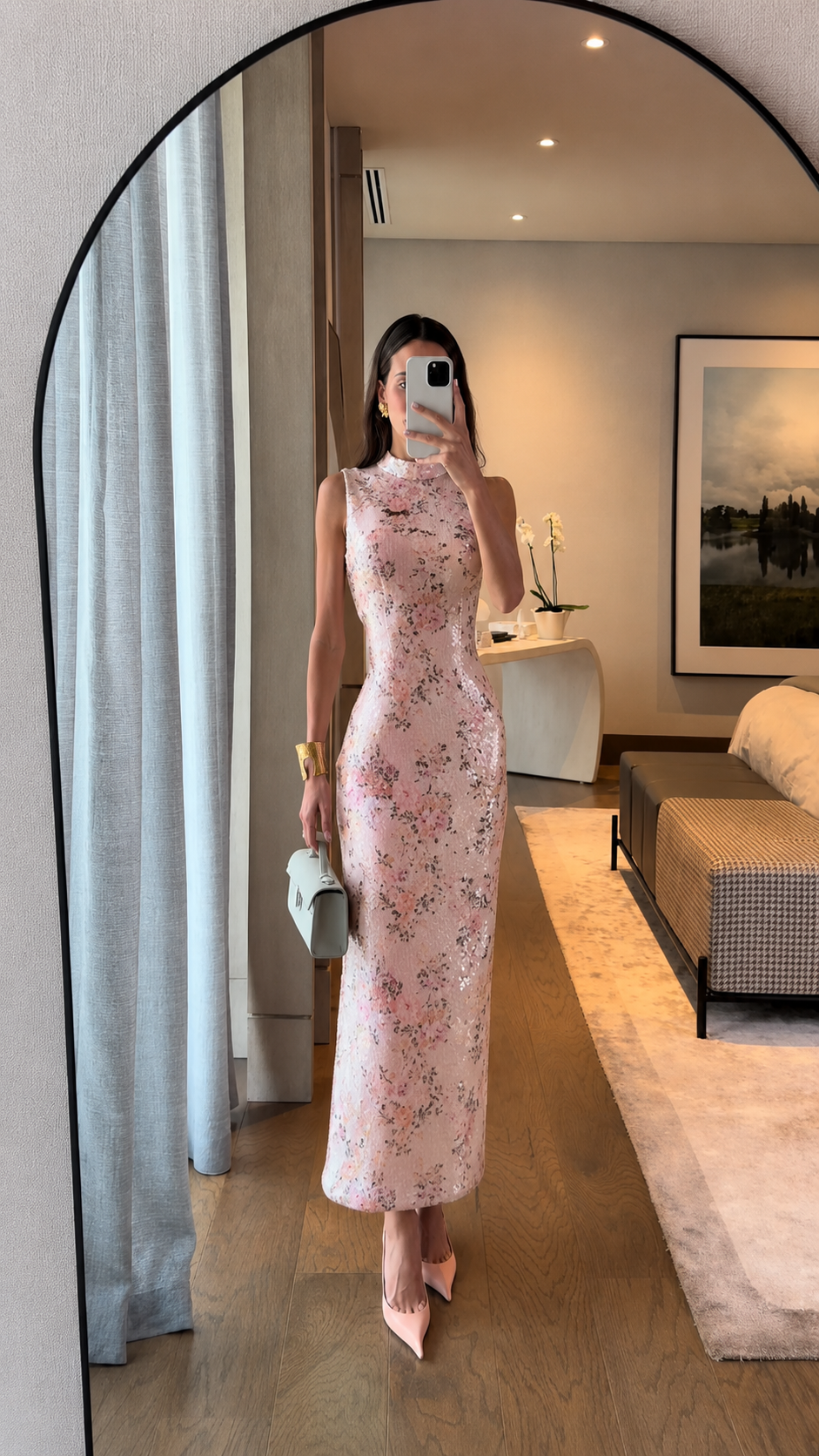 Front view of blush pink floral sleeveless fitted long dress