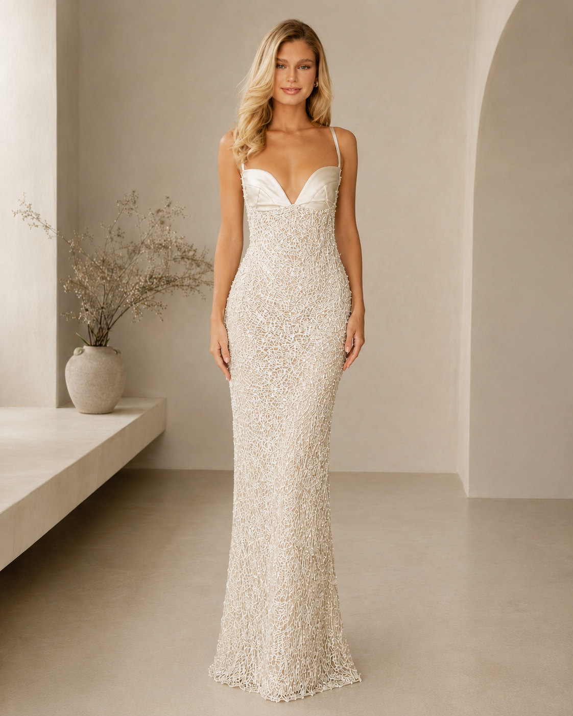 Front view of ivory sequin mermaid maxi gown with deep V bodice and floor-length hem