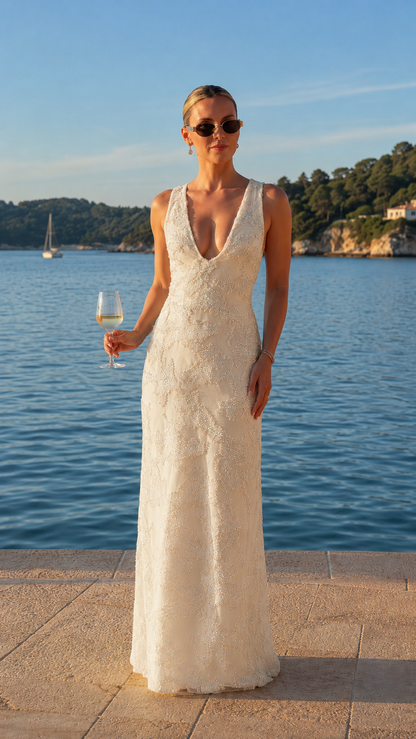 Front view of ivory deep V-neck embellished lace maxi evening dress
