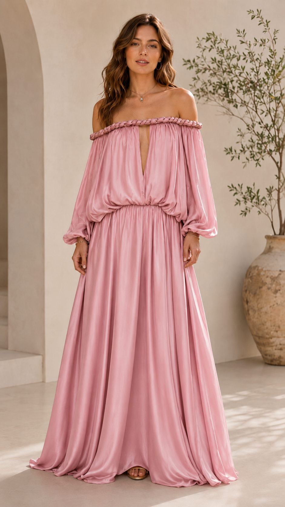 Front view of blush pink off shoulder maxi dress with floor-length skirt