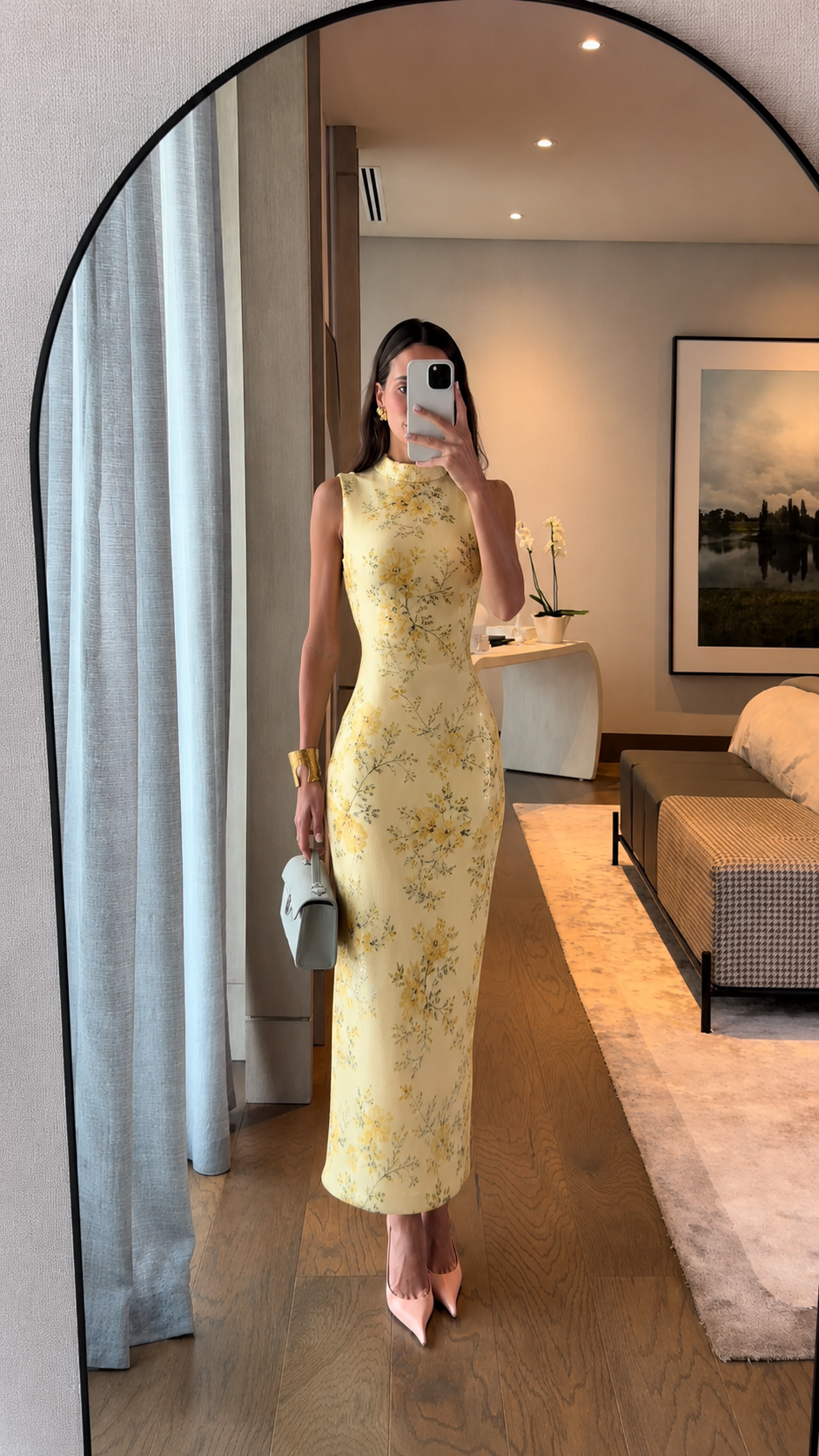 Front view of butter yellow floral sleeveless fitted long dress