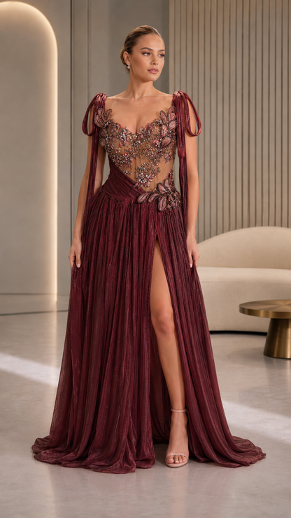 Burgundy formal gown with floral embellished bodice and dramatic slit