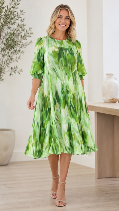 Front view of lime green tie-dye midi dress with flared hem