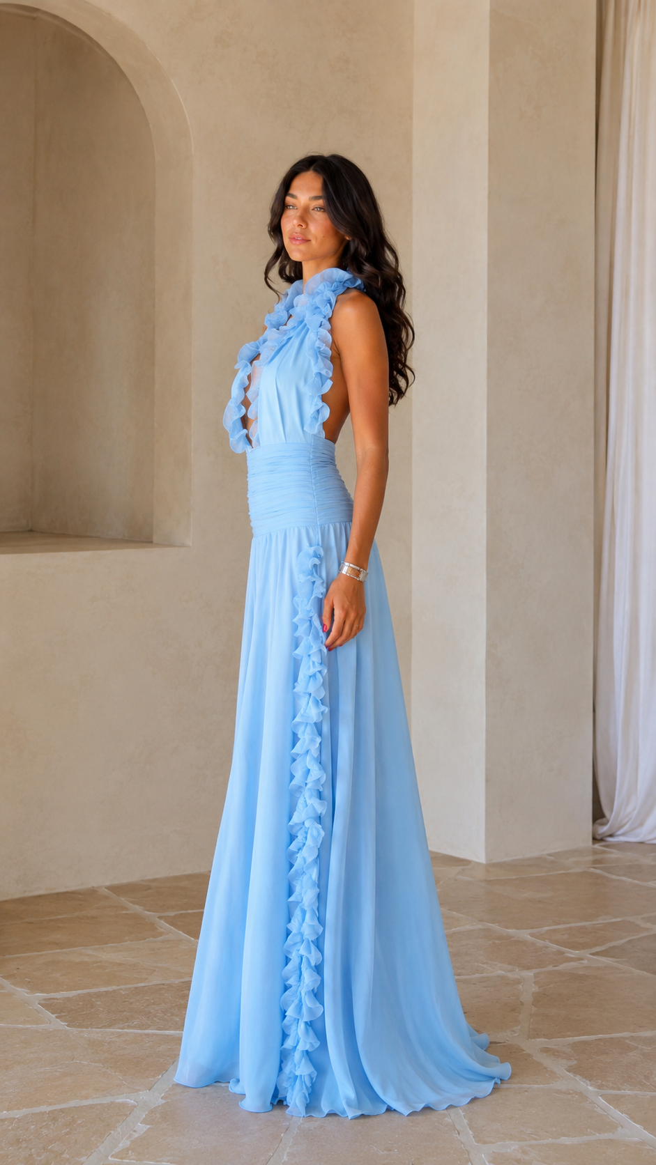 Side view of sky blue ruffle halter maxi dress