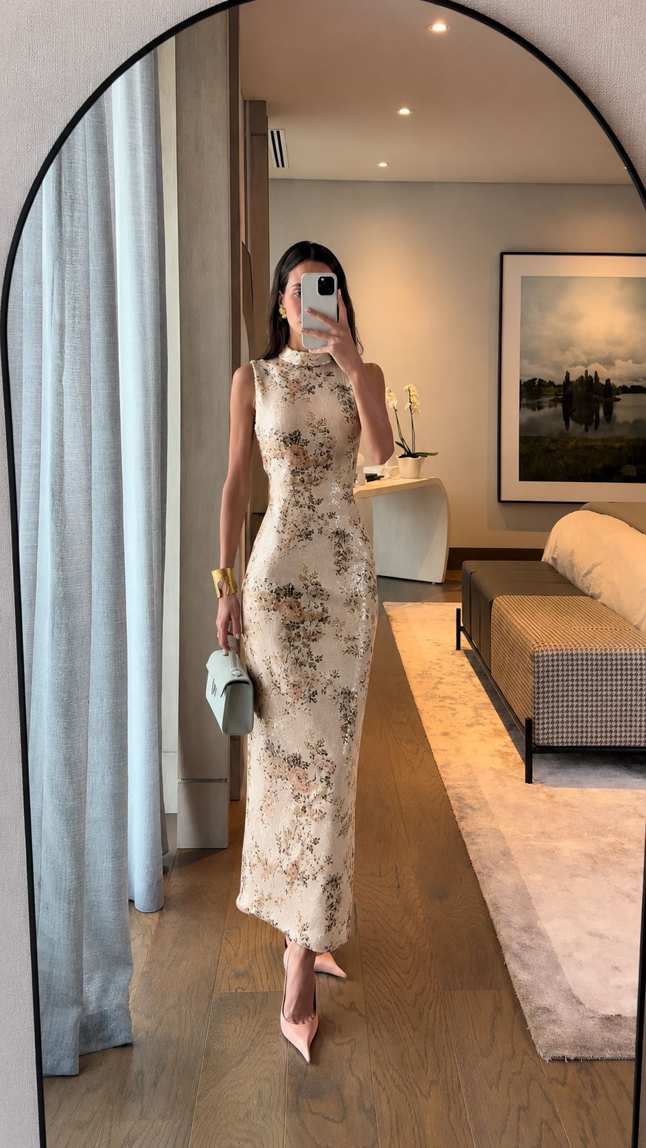 Front view of ivory floral sleeveless fitted long dress